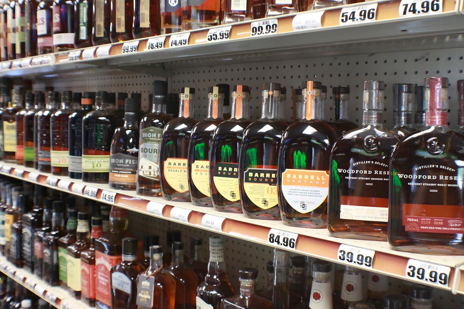 Bourbon shelf inside Bay Party Store